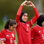 Banned from football at home, Afghan women’s team reunite 8,000 miles away