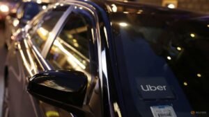 Uber doubles down on robotaxi plans, shares fall on weak profit forecast