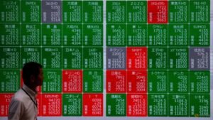 Asian stocks mostly down with tech firms back under pressure