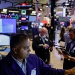 Nasdaq slides, yields elevated as Mideast conflict fears grow