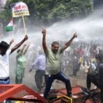 India police clash with protesters over jobs and exam transparency