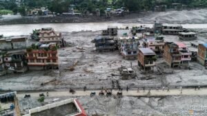 Rescuers dig into tunnel as missing toll from Nepal, China disaster nears 3,000