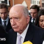 Alan Jones: Top Australian radio host groped two men as they drove, court hears