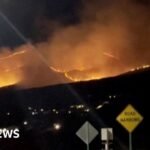 Nevada wildfire: Wildfire seen near Reno as tens of thousands told to evacuate