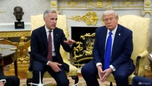Trump threatens tariffs on all cars and trucks to 50% amid Canada trade spat