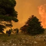 Greek mayor among three charged over wildfire near Athens
