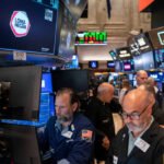 US stocks mostly up after data shows slightly lower inflation in July