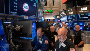 US stocks mostly up after data shows slightly lower inflation in July