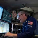 Stocks waver, dollar drops as US Treasury moves to lower bond yields