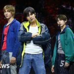 Should fans put their phones down at concerts? K-pop band Cortis thinks so