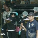 First responders in Thailand stand by following shooting