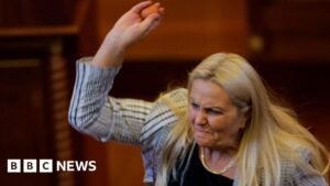 Moment opposition MP throws eggs at prime minister of Kosovo