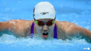 China’s 13-year-old Yu cruises as Asian Games swimming begins