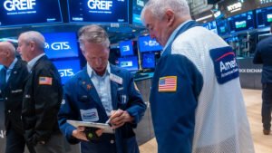 Oil down, but stocks lower as bond yields rise
