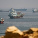 Tanker struck in Hormuz, raising worries over escalation, as Trump vows to hit Iran ‘hard’