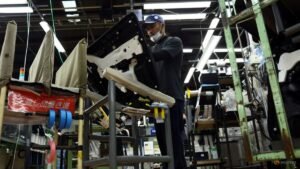 Japan manufacturers’ mood hits near 5-year high on semiconductor demand: Reuters poll