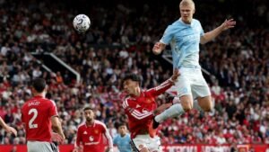 Haaland strike gives 10-man Man City contentious 1-0 derby win over Man United
