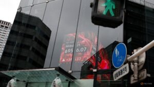 Asian shares waver as oil and yields rise ahead of Fed, BOJ meetings