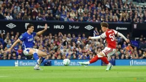 Teenager Dowman scores twice as Arsenal progress in League Cup