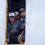 Indonesia recovers three bodies as effort begins to right capsized ship