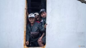Indonesia recovers three bodies as effort begins to right capsized ship