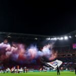 Ligue 1 clash briefly halted after Lyon fans unveil offensive banner
