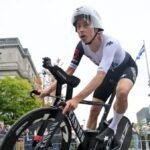 Evenepoel wins record fourth straight world time trial, Reusser retains women’s title