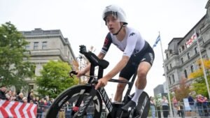 Birthday girl Reusser retains world time trial title in Montreal