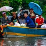 Bangkok floodwaters recede as officials race to drain canals