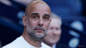 We will get through this together, says former City manager Guardiola