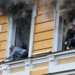 Ukraine: People escape historic Kyiv building hit by Russian drone