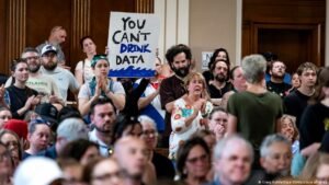 Why communities are fighting AI data centers