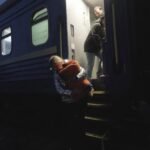 DW witnesses Ukrainian train evacuation.