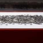 Amateur archeologist unearths Germany’s largest trove of Roman coins