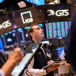 Stocks climb as oil retreats, Fed calms inflation fears
