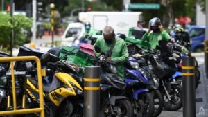 Commentary: Pressures of platform work in Singapore push drivers and riders to take risks