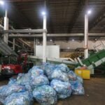 Over 33 million bottles and cans collected under beverage container return scheme; new sorting plant unveiled