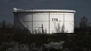 US jobs data boosts stocks as oil prices dip