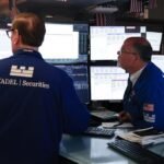 Euro slides as concerns about French debt mount