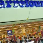 French supermarket giant’s shares plunge 12% after warning ‘unprecedented’ unrest will hit business