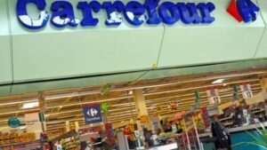 French supermarket giant’s shares plunge 12% after warning ‘unprecedented’ unrest will hit business