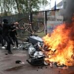 Student riots engulf France as far-right presidential frontrunner Le Pen vows fiscal turnaround