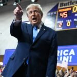 Trump reiterates pledge to send $5,000 checks, and hands out smaller payments, as midterm elections loom