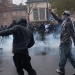 In pictures: Initially peaceful protests across France over inequality again descend into violence