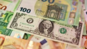 Dollar hits 17-month high versus euro as bond selloff lifts yields