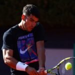 Alcaraz overcomes teething trouble on tweaked serve to beat Michelsen in Tokyo