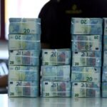 Dollar heads for fourth straight weekly gain versus euro
