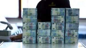 Dollar set for fourth weekly gain versus euro