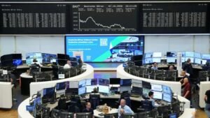 Oil eases, bringing some respite to stocks and battered bonds