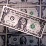 Dollar retreats from 18-month high despite strong inflation data